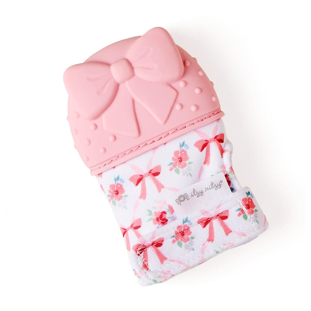 Itzy Ritzy Silicone Teething Mitt - Soothing Infant Teething Mitten with Adjustable Strap, Crinkle Sound & Textured Silicone to Soothe Sore & Swollen Gums - for Ages 3 Months & Up (Bow)
