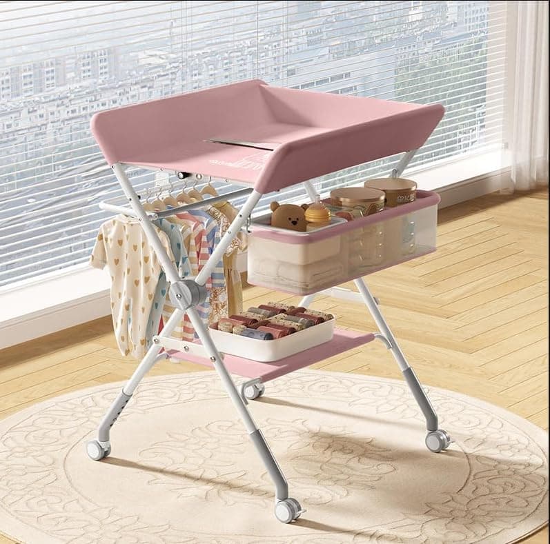 Baby Changing Table, Complete Newborn Care Unit with Practical Compartments, Adjustable Height for Greater Comfort, Movable Wheels and Foldable Design (PINK)