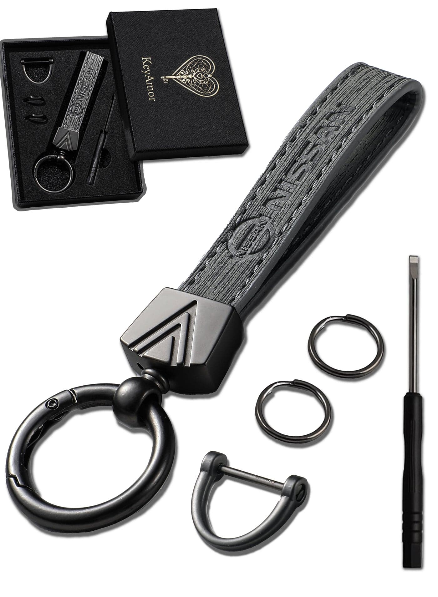 Elegant grey metal and leather keychain with NISSAN logo featuring 3 key rings perfect as a fancy gift or car accessory designed in sleek grey for a modern look offers 360 degree rotation for convenience suitable for both men and women and comes in a fancy gift box