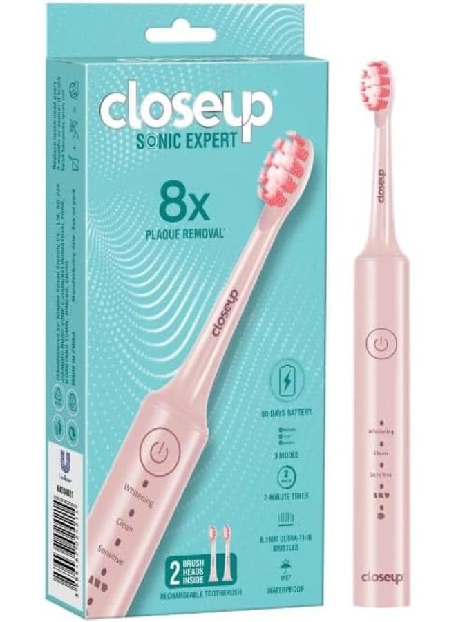 Close Up Sonic Expert Electric Toothbrush With rose gold colored toothbrush