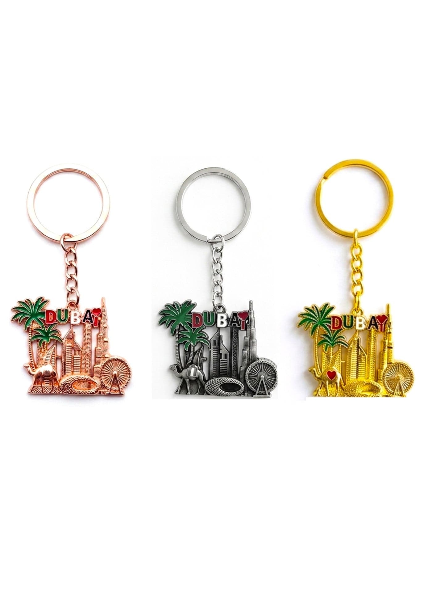 Premium Dubai Metal Keychain Set (3 pcs) featuring Dubai Museum, Ain Dubai, Burj Khalifa, and Palm Tree designs. One elegant design in three vibrant colors—perfect as a giveaway gift, everyday accessory, or the best Dubai souvenir.