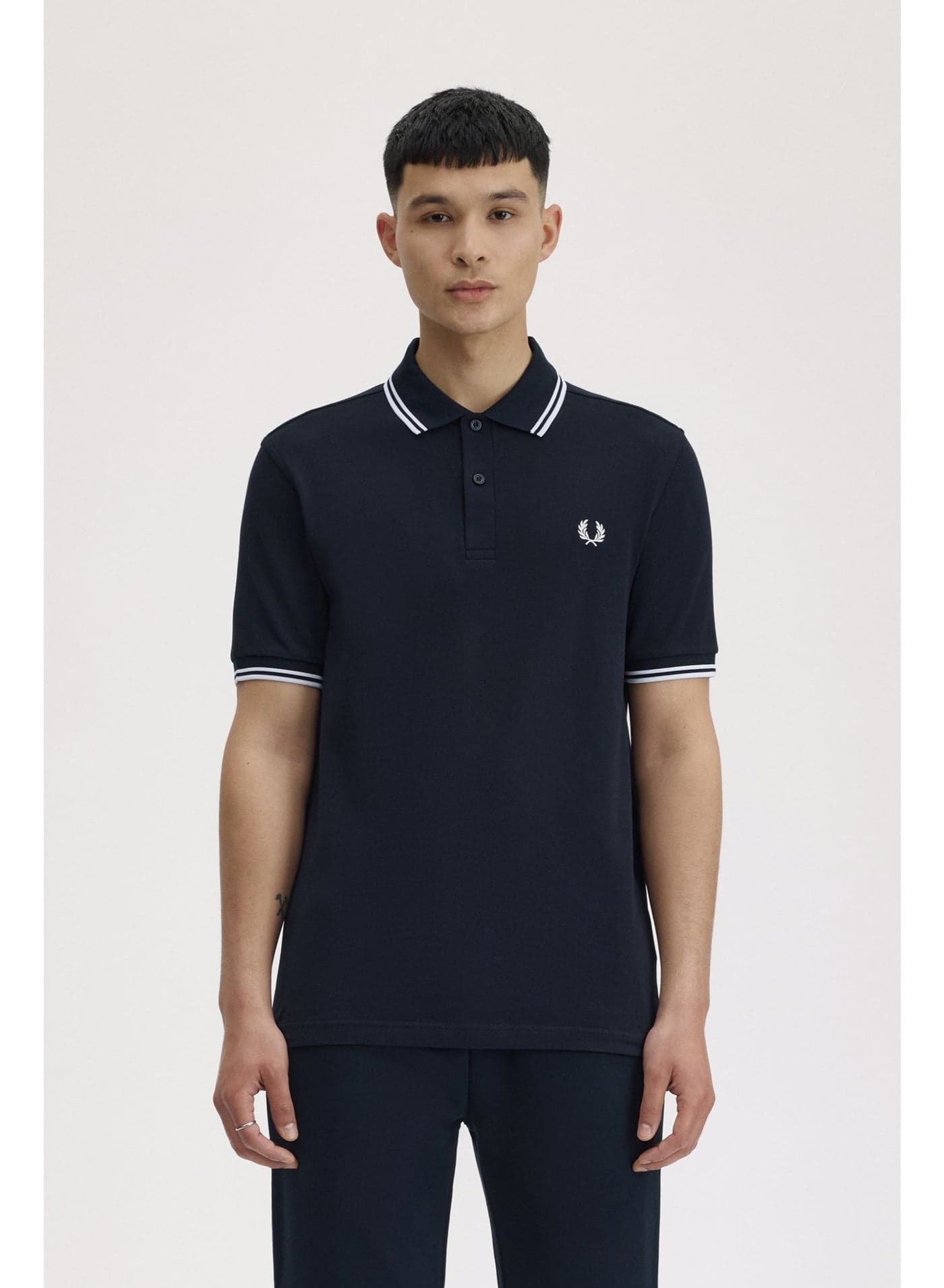 Fred Perry Polo shirt with contrast trim | Premium breathable mesh cotton short sleeve casual shirt with laurel wreath logo.