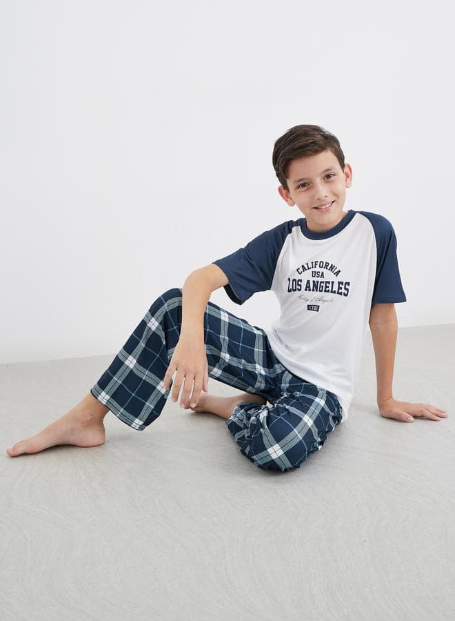 Printed Raglan Sleeve T-Shirt And Check Pyjama Set