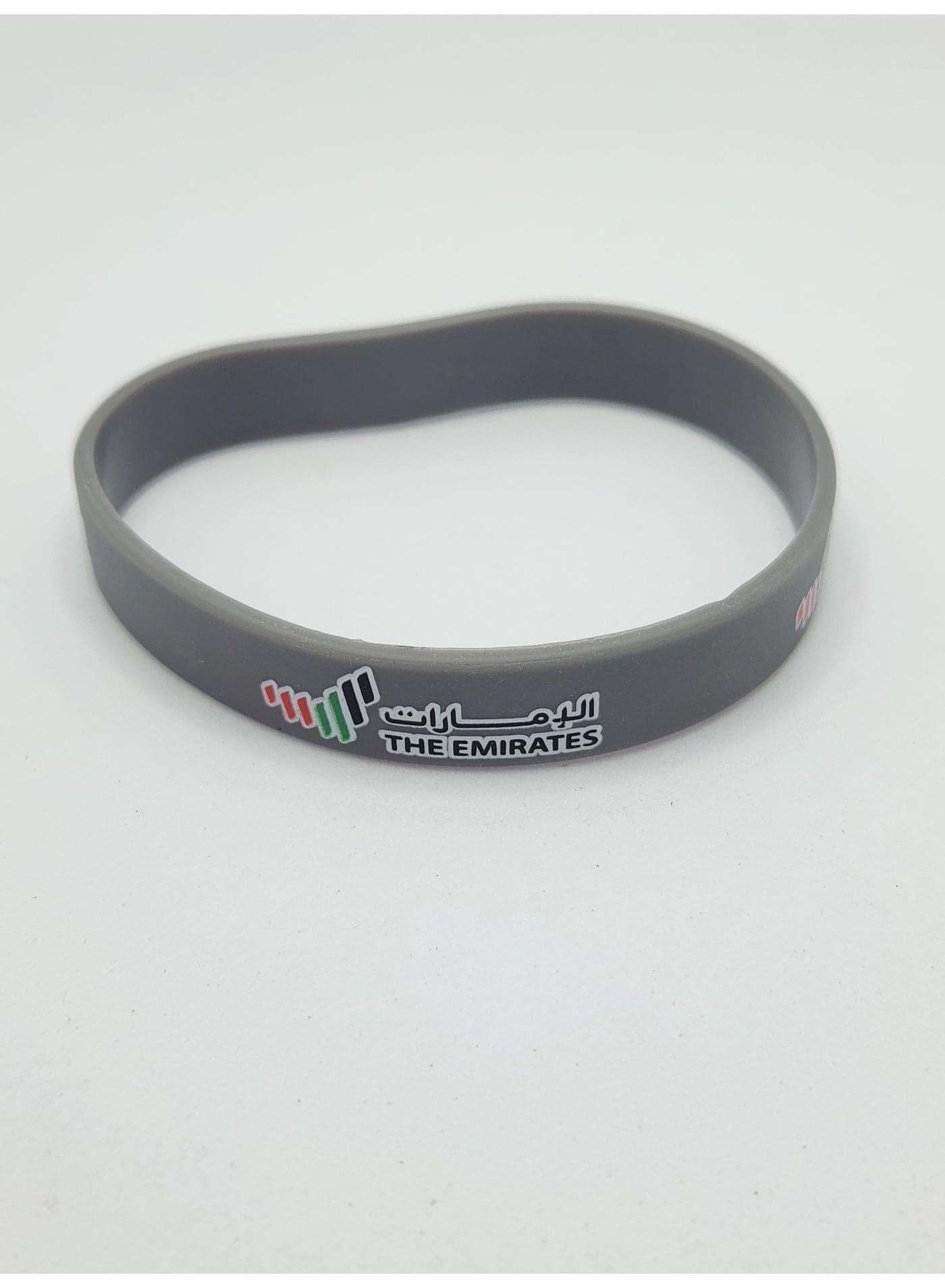 "UAE Flag Silicone Wristband – Silver Bracelet with The Emirates Logo – Unisex National Pride Accessory"