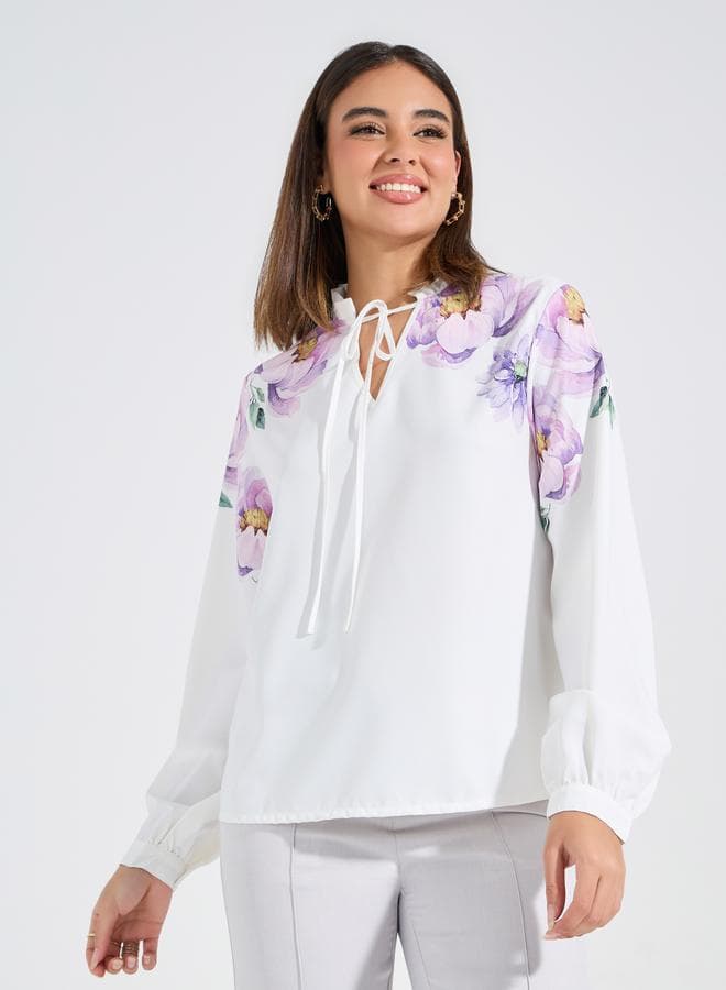 Floral Placement Print Tie-Up Neck Blouse