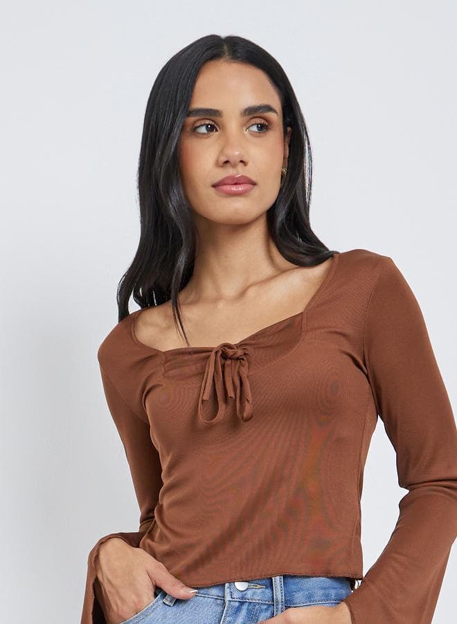Styli Solid Tie Up Neck Long Sleeve Top