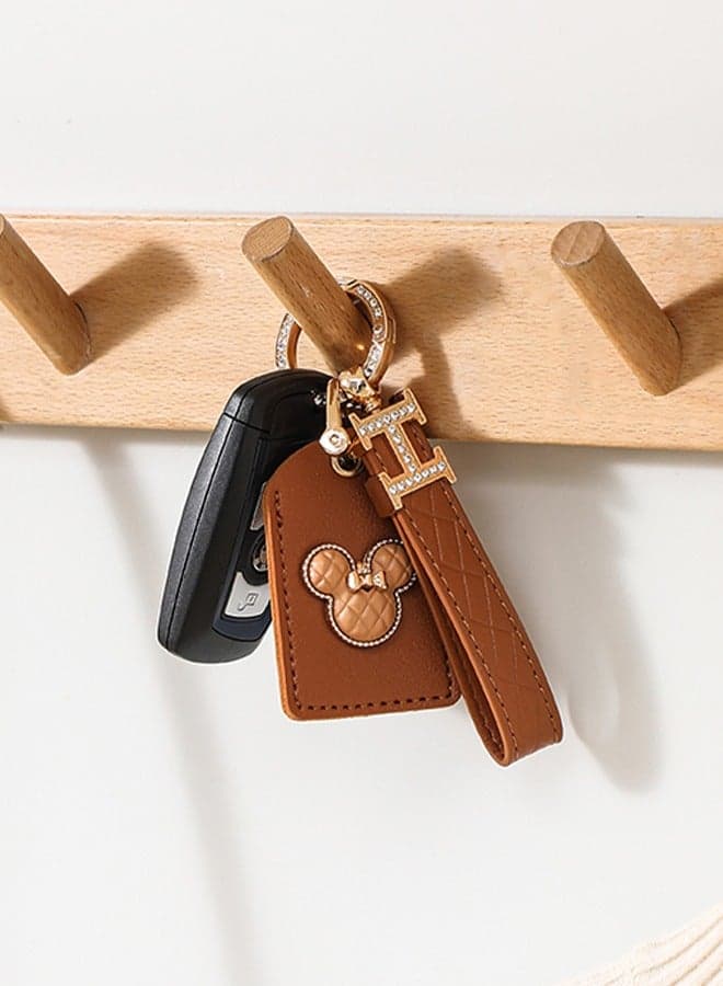 KeyAmor Elegant Leather Keychain with AirTag Holder – Quilted Brown Leather & Gold Crystal Rings – 360° Spinning Key Ring for Women – Gift Box Included